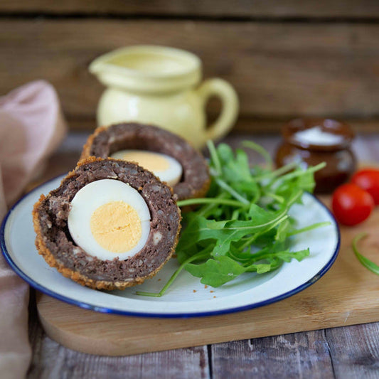 Scotch egg with rocket