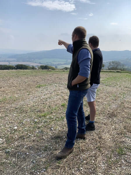 Jack and Christian, Jack pointing across the land