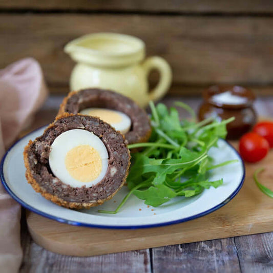 Scotch egg with rocket