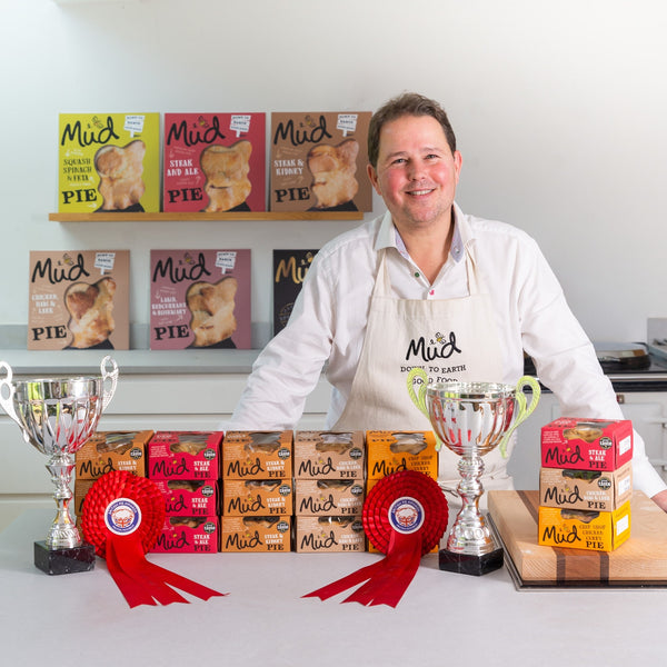 Christian with pies and awards