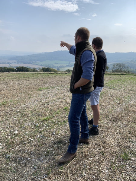 Jack and Christian, Jack pointing across the land