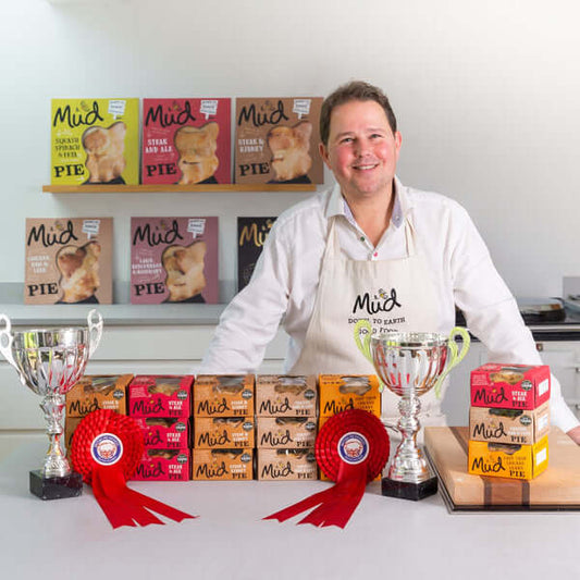 Christian with pies and awards