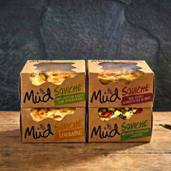 Square quiche selection box featuring four unique flavors from Mud Saviche, including Lorraine and Roasted Vegetable.