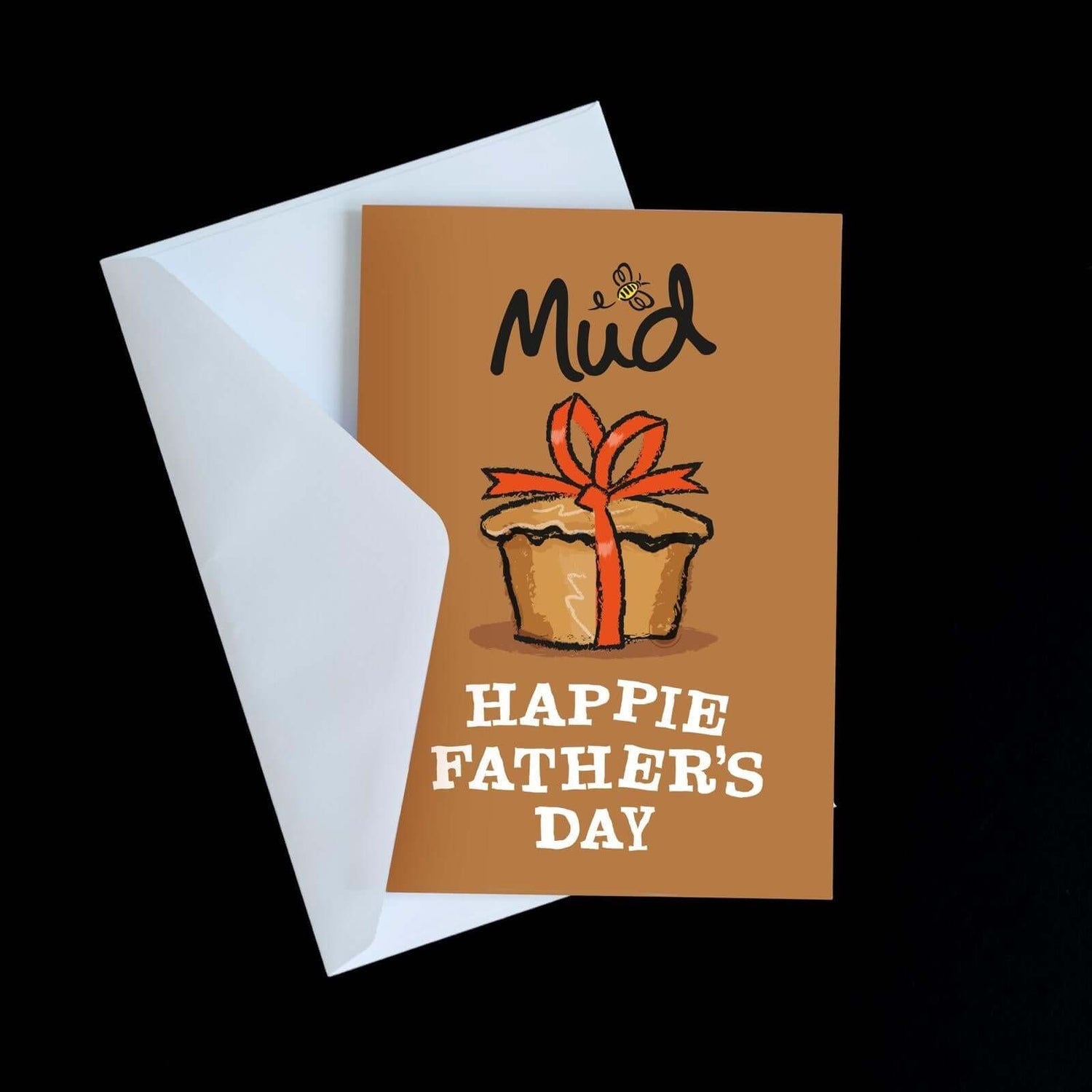 The Mud Pies Father's Day Greetings Card shows a brown background, mud pie, orange ribbon, bee and “HAPPIE FATHER’S DAY” in white.